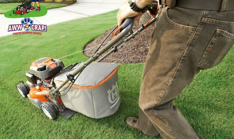 A person is mowing the lawn with a bag-equipped lawn mower; there's a playful business logo in the corner.