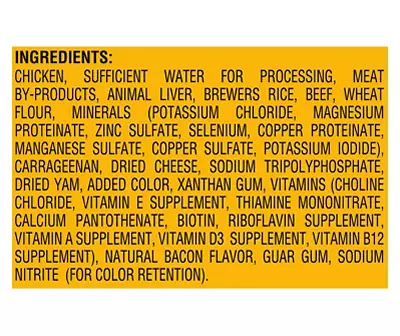 dog food label - Pooper Scooper Service | Lawn Mowing Service The image displays a list of ingredients, including chicken by-products and various vitamins, likely for pet food.